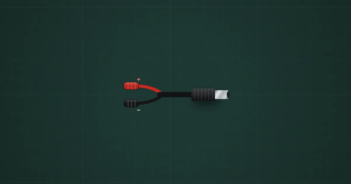 DC barrel plug (bare wires) on the simulator's bench