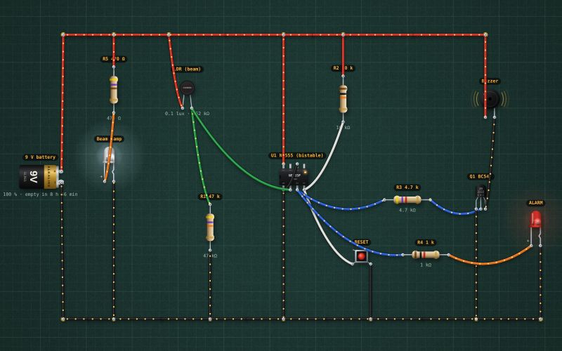 Light-barrier alarm that latches: LDR + 555 bistable: the circuit on the lab bench